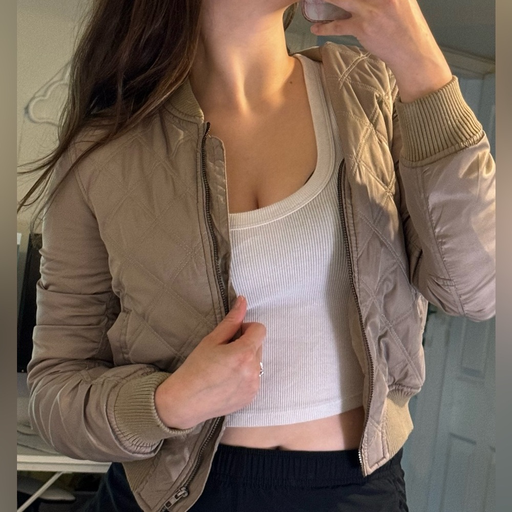 Tan Bomber Jacket with Ribbed Cuffs and Quilted Stitching